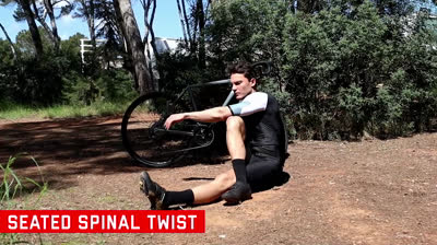 Basic stretches for cycling - Seated spinal twist