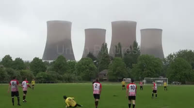 Four chimneys are knocked down during a soccer match